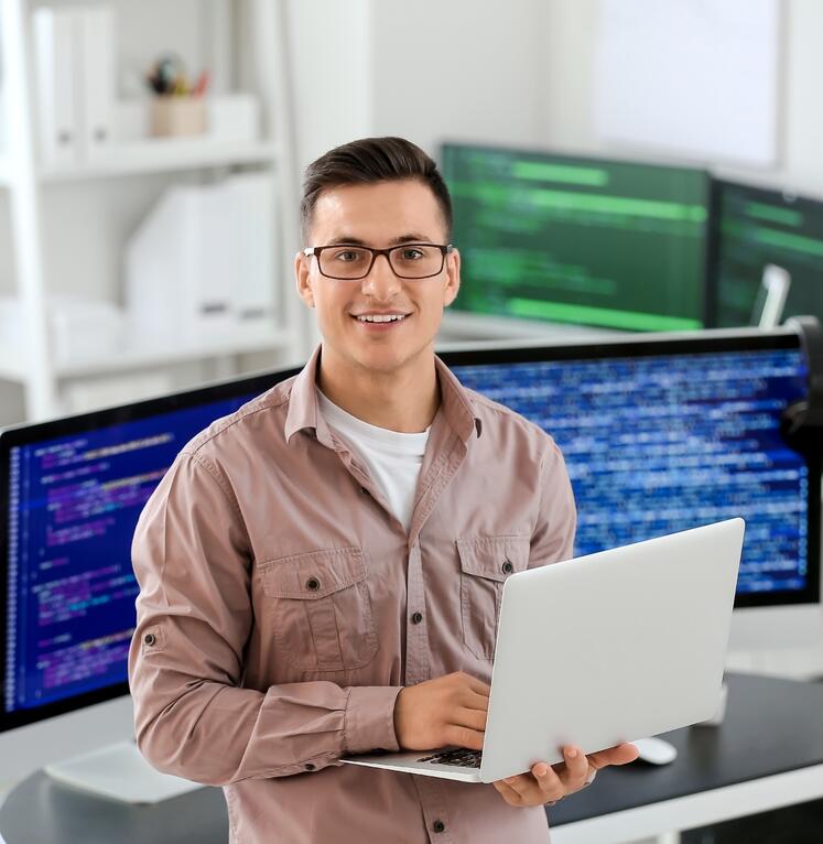 Learner with laptop in hand
