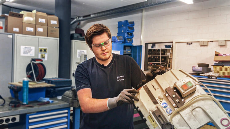 Apprentice in plant maintenance at work