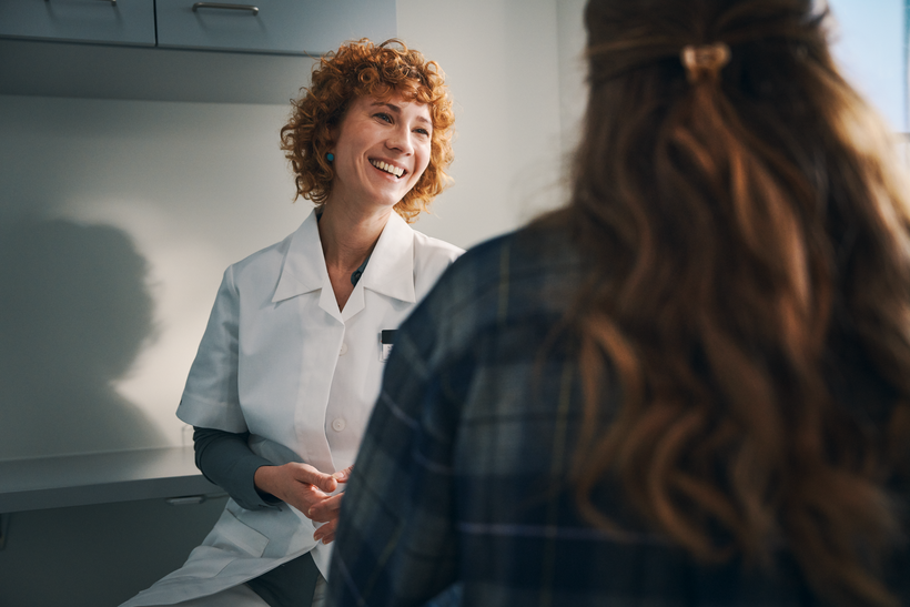 Three professionals in a meeting